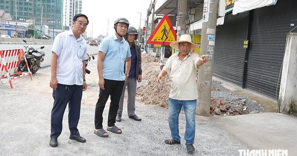 Nâng nền quốc lộ 13 khiến nhà dân thấp hơn mặt đường: Chính quyền xuống khảo sát