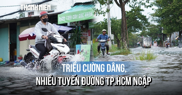 Nước triều dâng gây ngập nhiều tuyến đường TP.HCM: Xe máy quay đầu, leo lề tránh nước