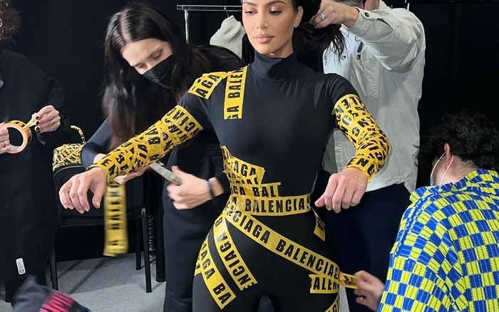 Kim Kardashian Wears a Balenciaga Caution Tape Catsuit
