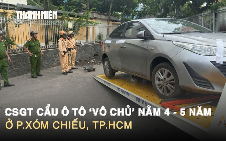 CSGT cẩu ô tô ‘vô chủ’ nằm 4 - 5 năm ở Xóm Chiếu, TP.HCM