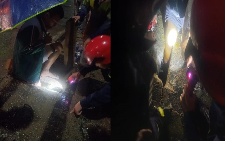 Giải cứu người đàn ông kẹt chân dưới khe cống thoát nước