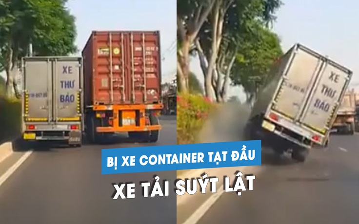 'Ớn lạnh' xe tải bị xe container chuyển làn ẩu, ép lên dải phân cách suýt lật
