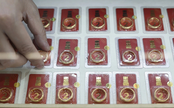 Giá vàng tăng kỷ lục, USD hạ nhiệt