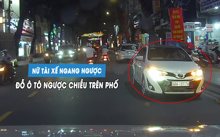 Nữ tài xế ngang ngược đỗ ô tô ngược chiều trên phố... chờ đón con
