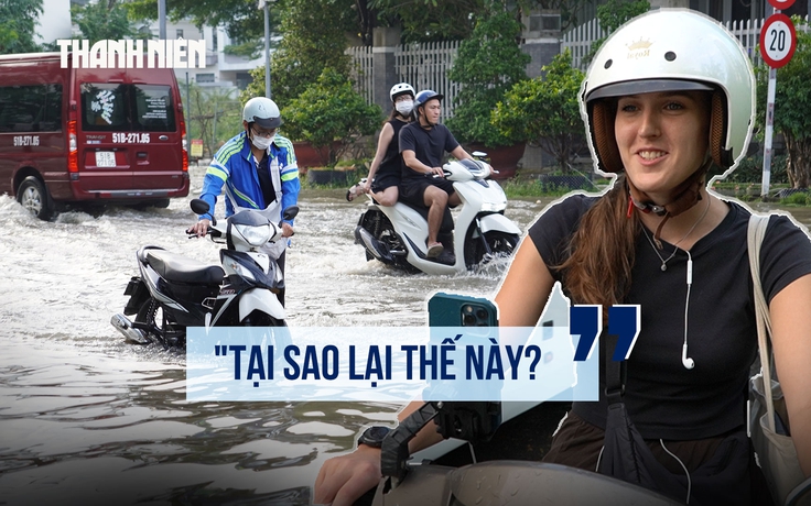 Du khách Anh lần đầu thấy cảnh đường hóa thành sông, phải thay dép lội nước: 'Tại sao lại thế này?'