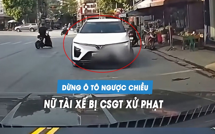 Nữ tài xế bị CSGT xử phạt vì dừng ô tô ngược chiều trên quốc lộ