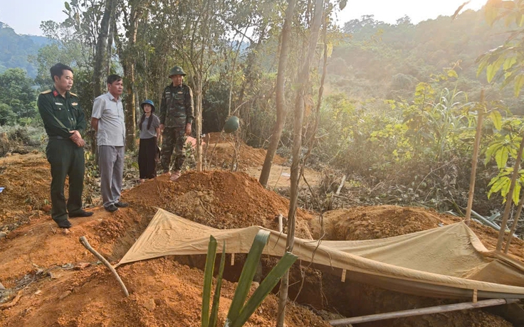 Tìm thấy 2 hài cốt liệt sĩ cùng tăng võng, cúc áo, gương soi