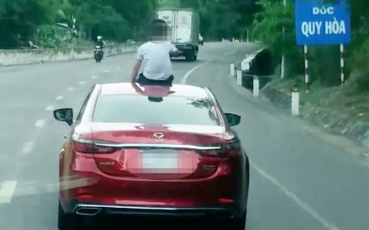 Bình Định: Một phụ nữ ở Quy Nhơn bị tước bằng lái vì để con ngồi trên mui xe