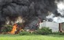 TP.HCM: Cháy lớn ở bãi chứa pallet gỗ, khu dân cư náo loạn