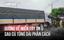 Xe tải tông dải phân cách, đường về miền Tây chật vật giữa trời mưa