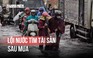 Quốc lộ 50 hóa sông sau cơn mưa, người dân bì bõm tìm tài sản