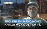 Người lao động vất vả mưu sinh dưới thời tiết thất thường