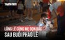 Cùng mẹ dọn rác sau buổi pháo lễ: ‘lòng yêu nước qua hành động nhỏ’